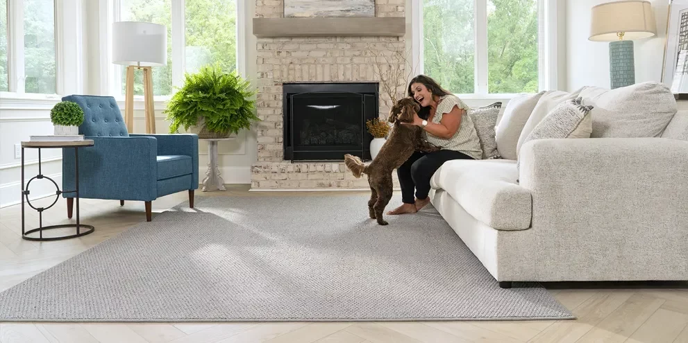 Lady playing with dog