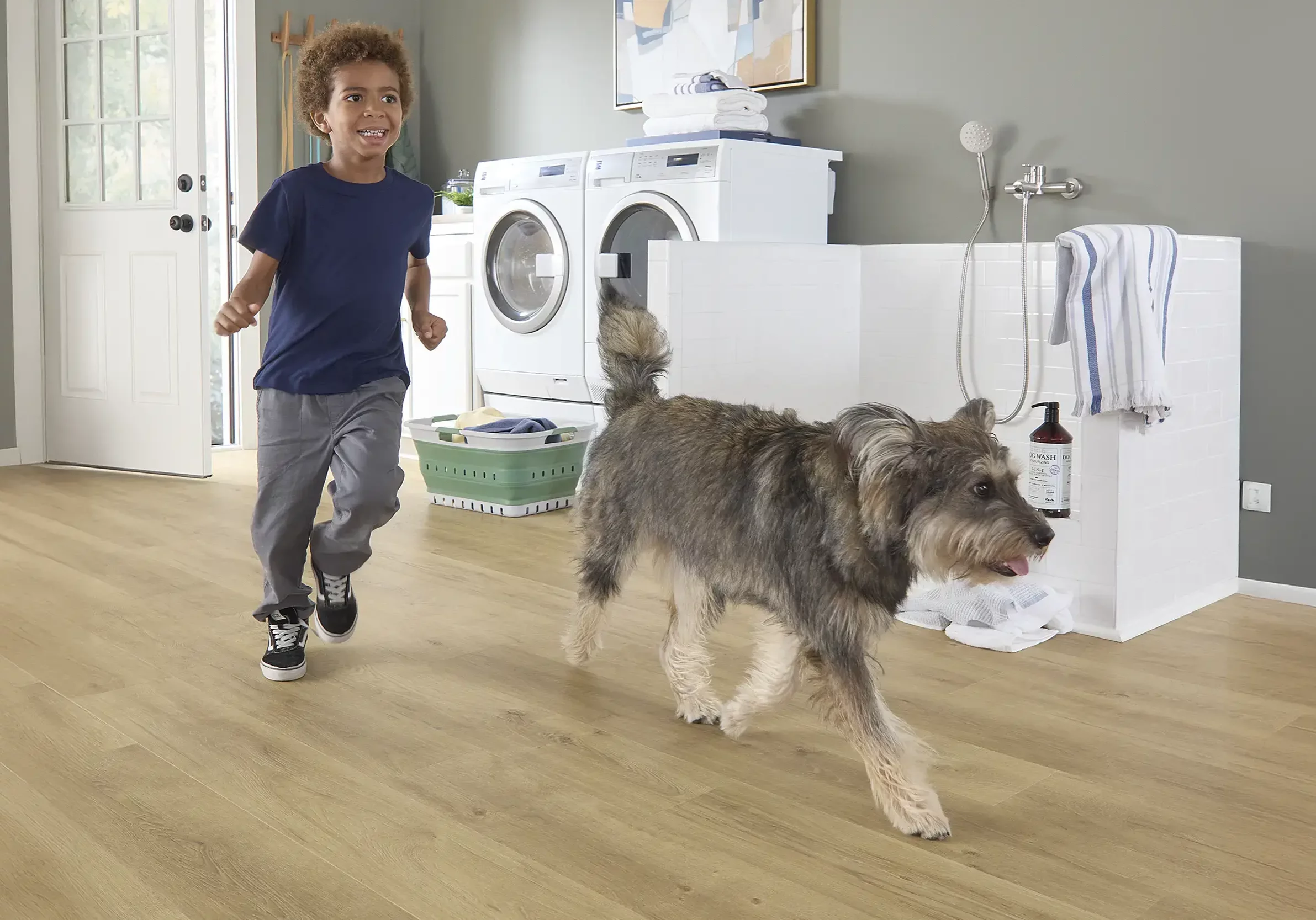 Kid playing with pet